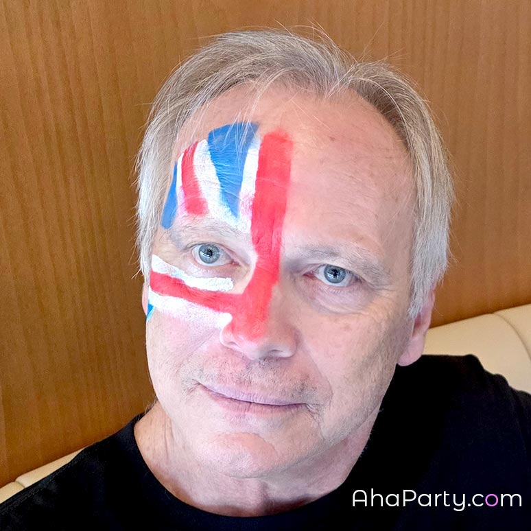 Adult with Union Jack face painting at a Dallas FIFA World Cup watch party event